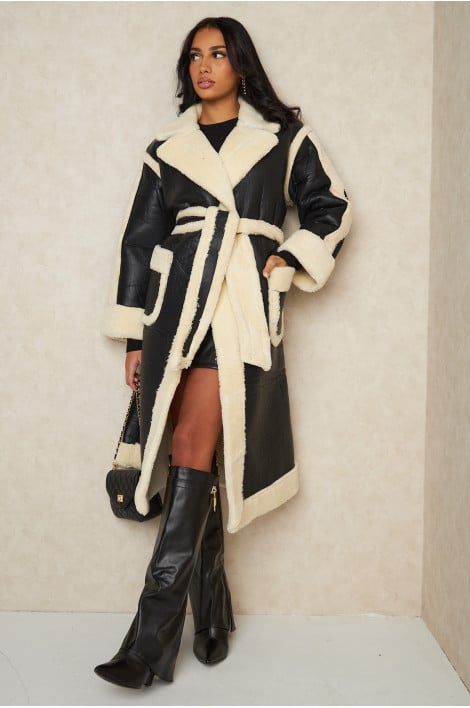 Veste longue en cuir à fourrure