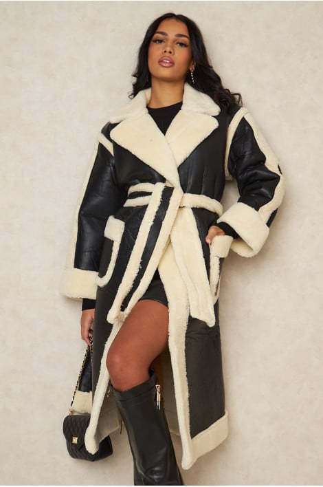 Veste longue en cuir à fourrure