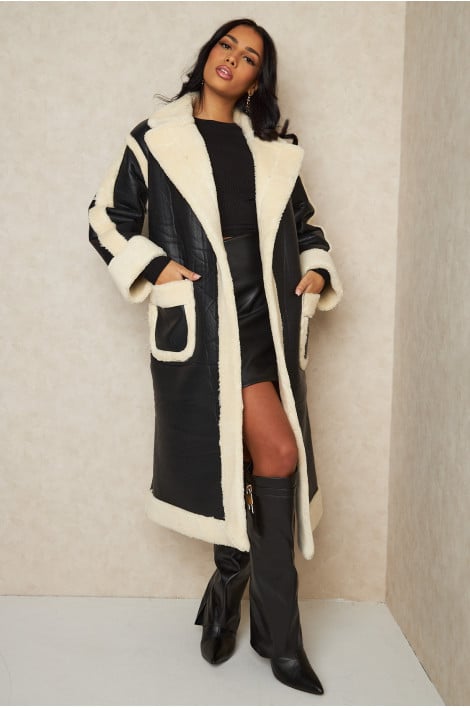 Veste longue en cuir à fourrure